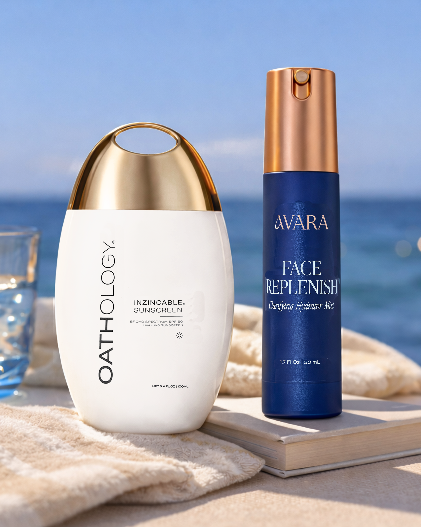 Two skincare products, 'Oathology' and 'Avara', on a sandy surface with ocean in the background.